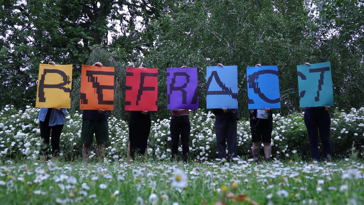 Show posters spelling out the word 'REFRACT'