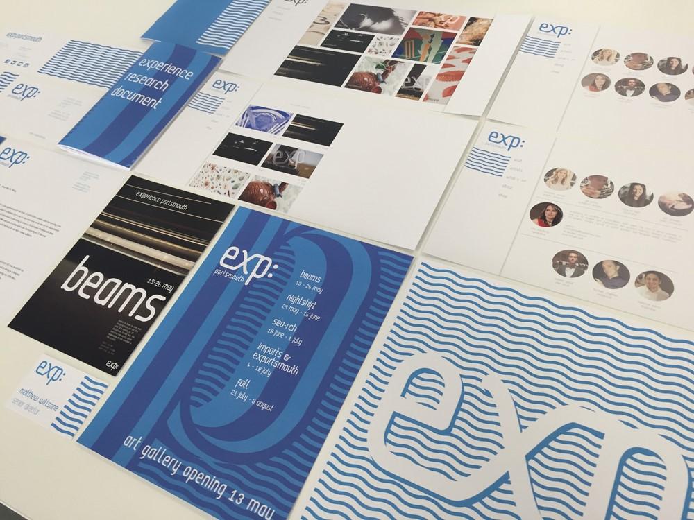 Series of typographic posters laid out next to one another at an angle