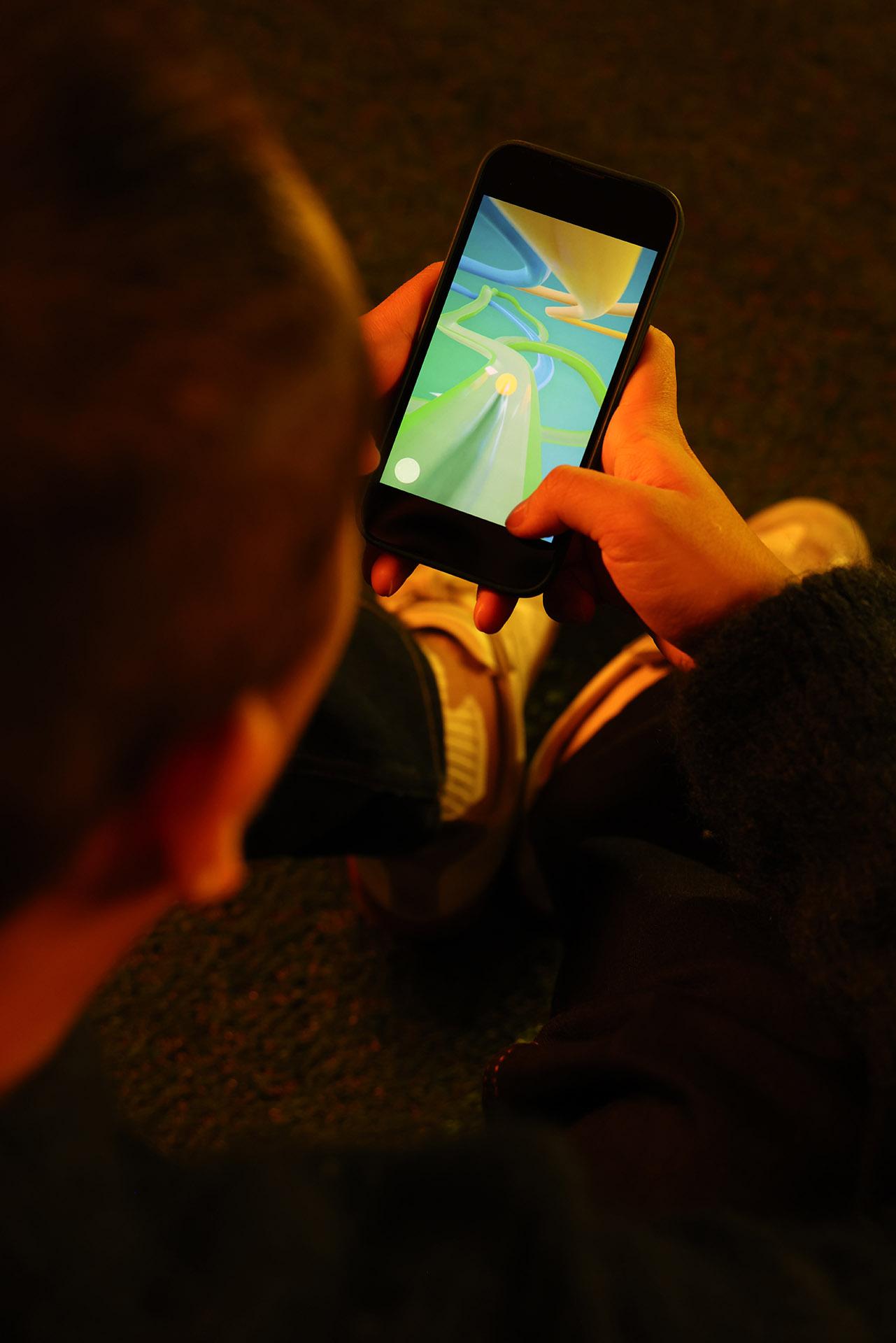 Close up of phone screen with game play