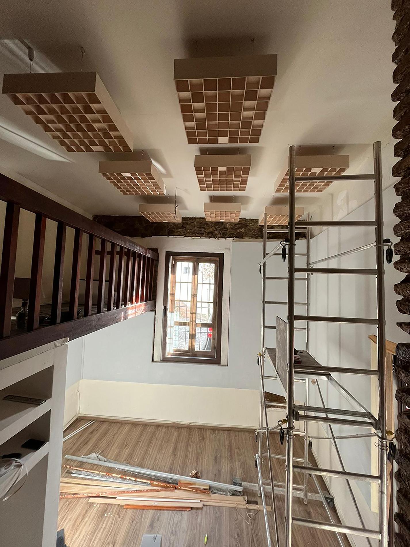 Photograph of recording studio interior in process of renovation.