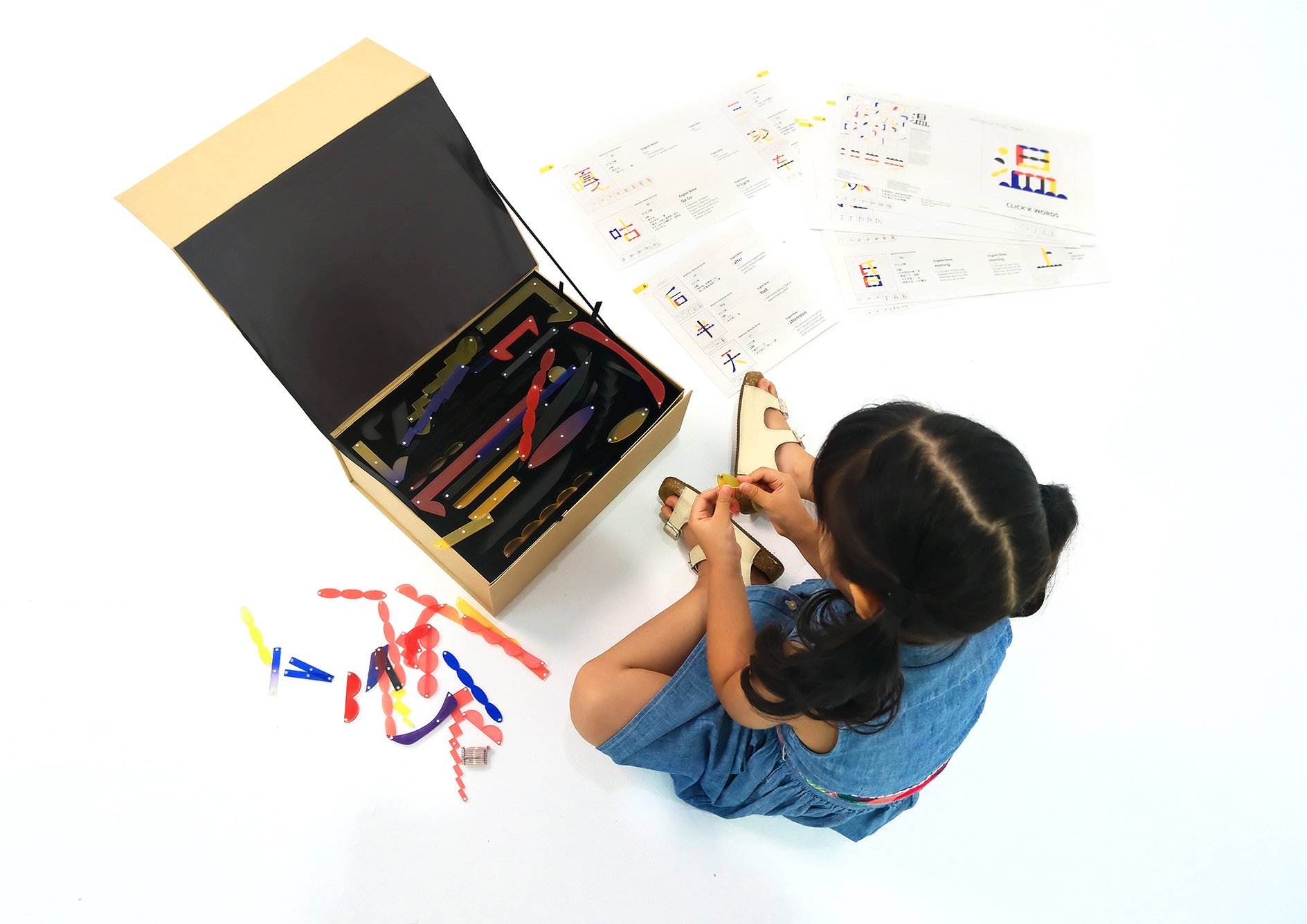 Child, Dictionary and Toy