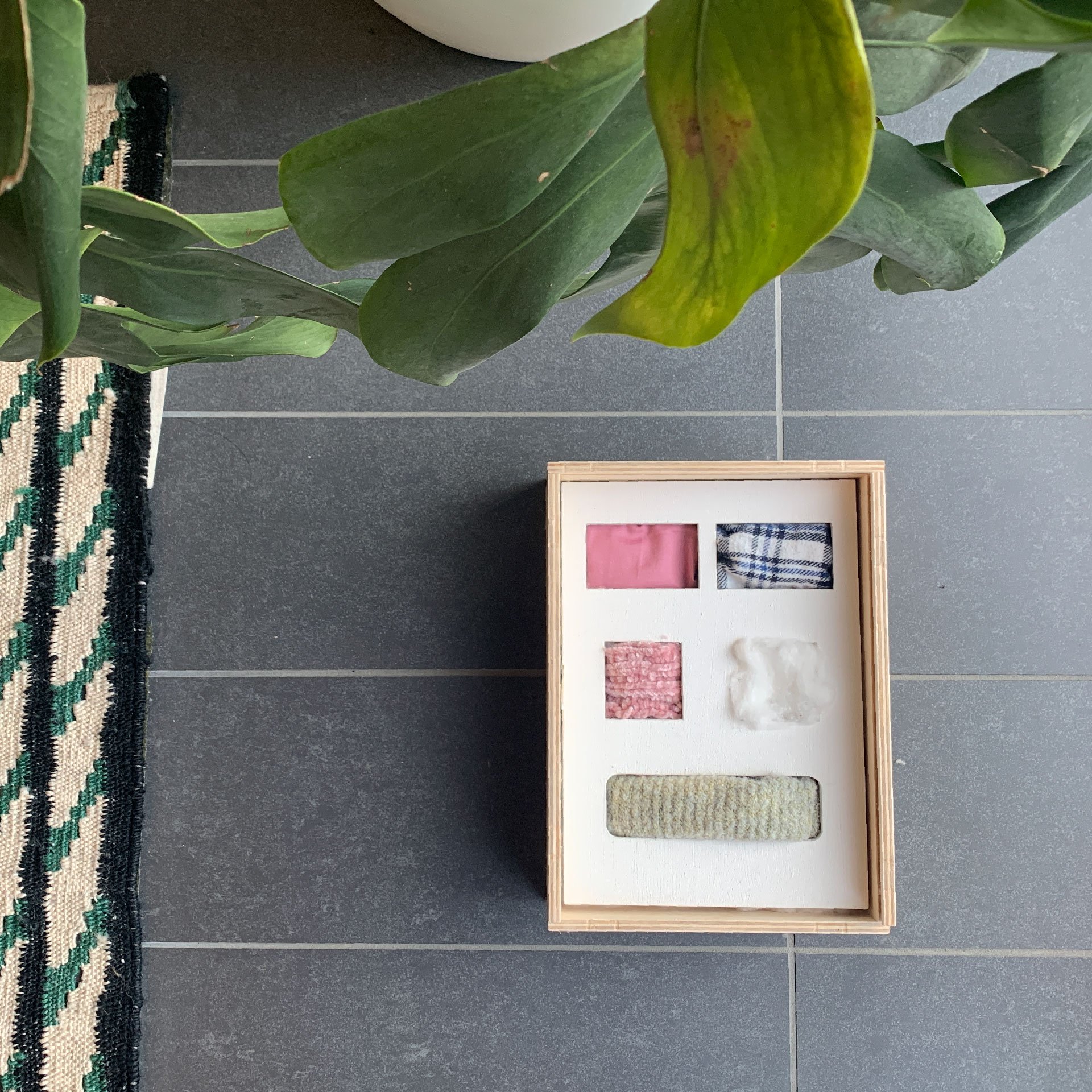 This is further followed by five textures derived from the setting of a bed. The pillows, blanket, bed sheet, and sometimes a soft toy. The small pieces in the box resonate with an eight hour-long ignored comfort, every day.