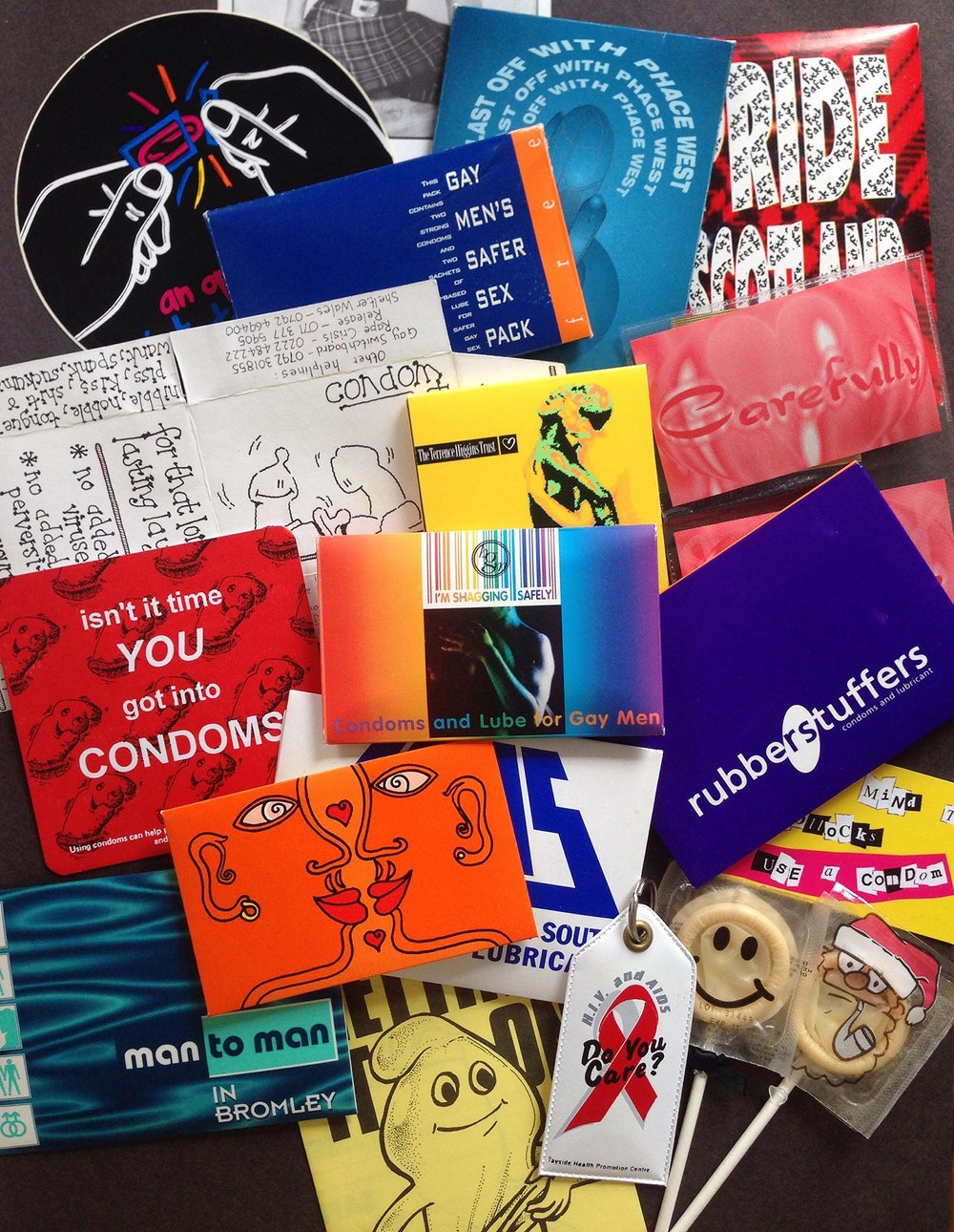 Selection of condom packaging and promotional items from the UK HIV Graphic Communication Archive.